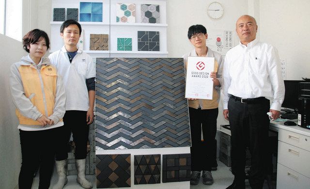 グッドデザイン賞を獲得したＴＮコーポレーションの皆さん。右から２人目が千田さん＝可児市広見で 