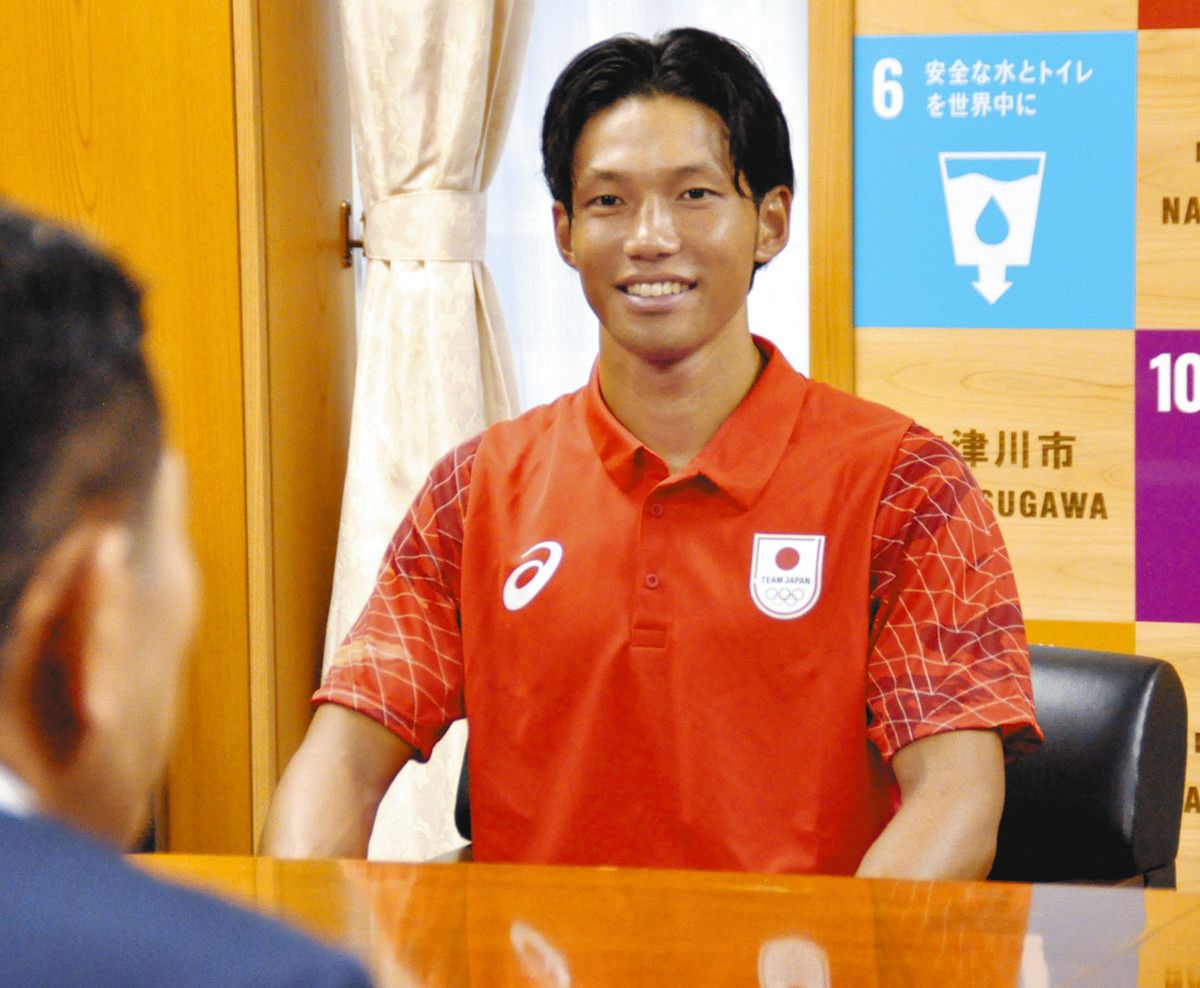 アジア大会への意気込みを語る田中選手＝中津川市役所で
