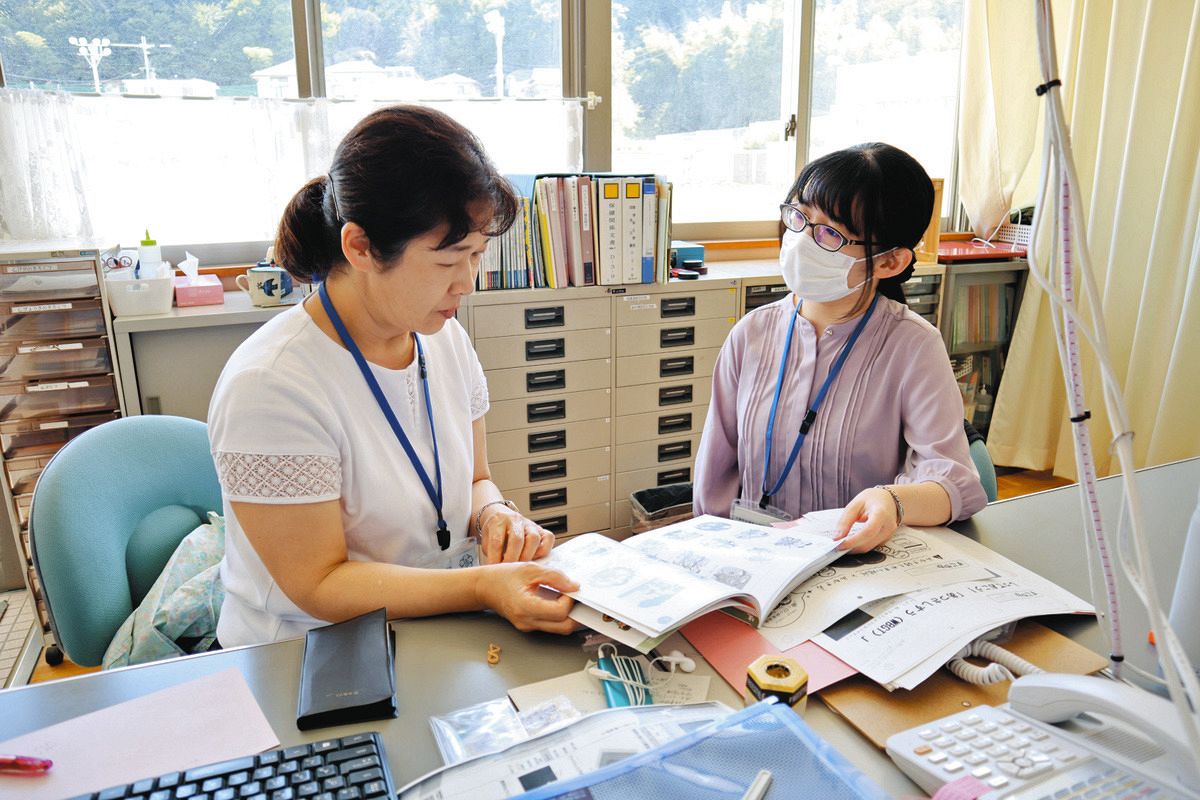 保健 室 の 先生