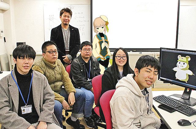 ハム助を制作した名古屋工学院専門学校の学生ら＝名古屋市熱田区で 